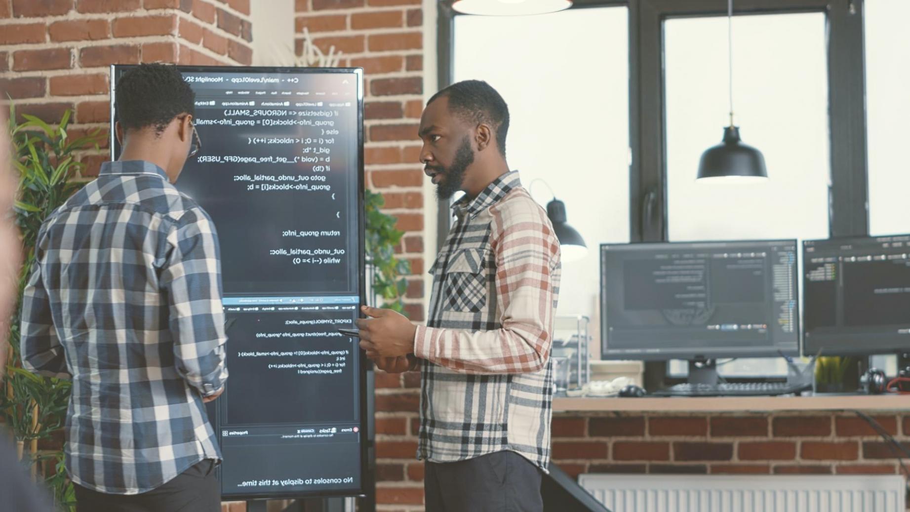 Team reviewing financial system architecture and workflow optimization